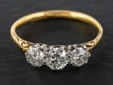 An old-cut diamond, three-stone ring, total estimated diamond weight 1.