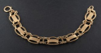 A fancy-link bracelet, with engine-turned decoration, stamped '9CT', total length ca. 18.