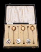 A set of six Elizabeth II silver gilt and enamel seal top coffee spoons, maker SL, Birmingham,