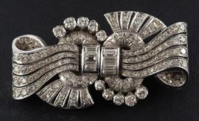 A pair of Art Deco, baguette, single and round, brilliant-cut diamond brooch clips,