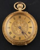 An early 20th century pocket watch, the gilt dial with engraved floral decoration,