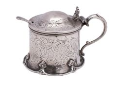 A Victorian silver mustard pot, maker Robert Harper, London, 1856 of spreading cylindrical form,