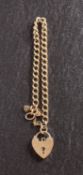 A 9ct gold, curb-link bracelet with heart-shaped clasp, with hallmarks for London, 1967, length ca.