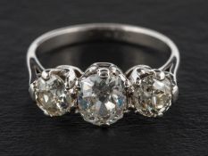An old-cut diamond, three-stone ring, total estimated diamond weight ca.