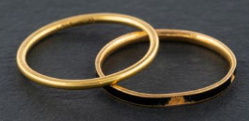 Two band rings, including a black enamel mourning ring, ring sizes M-O, total weight ca. 2.8gms.