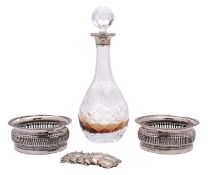 An Elizabeth II silver mounted clear glass decanter and stopper, maker W I Broadway & Co,