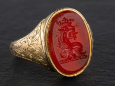 A carnelian signet ring, engraved with heraldic crest, length of ring head ca. 1.