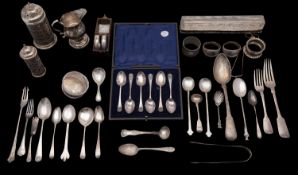A mixed collection of silverwares, various makers and dates, includes sugar caster, napkin rings,