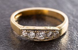 An 18ct gold, round, brilliant-cut diamond, five-stone ring, total estimated diamond weight ca. 0.