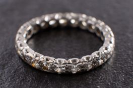 A round, brilliant-cut diamond, full-eternity ring, total estimated diamond weight ca. 0.