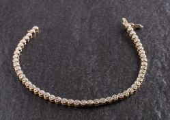 A 9ct gold, single-cut diamond, tennis bracelet, total estimated diamond weight ca. 0.