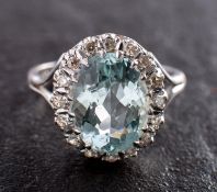 An aquamarine and single-cut diamond cluster ring, estimated aquamarine weight ca. 3.