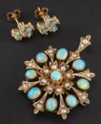 An cabochon-cut opal and seed pearl pendant/ brooch together with associated opal and diamond