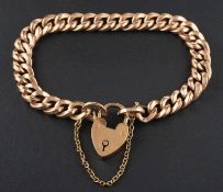 A curb-link bracelet with heart-shaped clasp, the clasp stamped '9C', length ca.