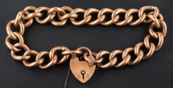 A curb-link bracelet with heart-shaped clasp, the clasp stamped '9CT', the links stamped '9C',