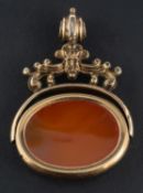 A gilt metal carnelian swivel fob, total length ca. 4.8cm.