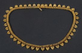 An Etruscan Revival palmette fringe necklace, with cannetille work, total length ca. 44.