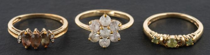 Three 9ct gold, gemset rings, including a white sapphire cluster,
