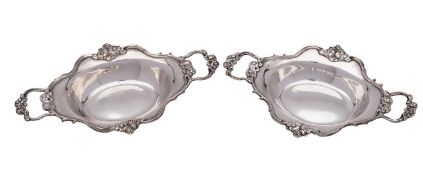 A pair of late Victorian silver twin-handled sweetmeat dishes,