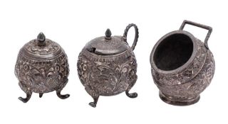 An Indian silver three-piece condiment set with foliate and scroll decoration, 154gms, 4.95ozs.