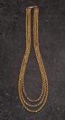 A three-row, belcher-link, watch chain, with dog clip, the dog clip and the chain stamped '9CT',