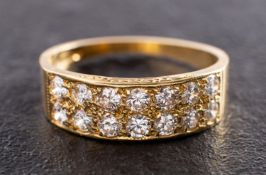 An 18ct gold, round, brilliant-cut diamond, double-row, half eternity ring,