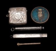 A mixed collection of silver items, including a vesta case,