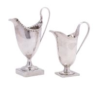 A George III silver cream jug, maker 's mark worn, London, 1790 initialled,
