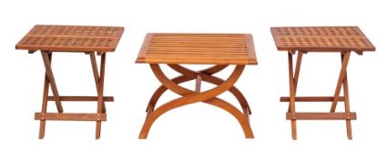 A pair of teak folding occasional tables,