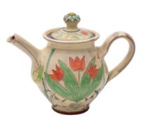 A terracotta tea pot and cover,