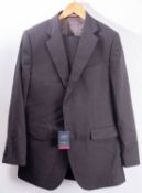 A Charles Tyrwhtt charcoal slim fit birds eye three piece suit, the jacket 42 regular,