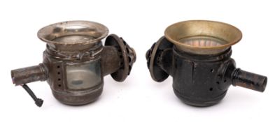 A sheet metal and brass carriage lamp and one other of similar design.