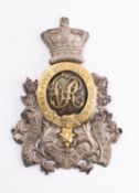 A Victorian 1st Royal Devon Yeomanry Cavalry helmet plate: Queen's crown oval with central 'VR'