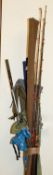 A collection of various sea fishing rods.