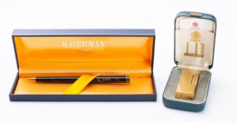 A gold plated Dunhill Rollagas lighter in original case,