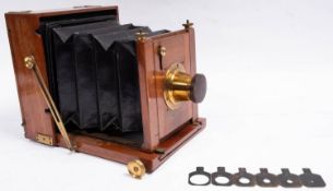 A Perkin Son & Rayment mahogany and brass half plate field camera,