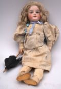 A German bisque head doll, applied blonde wig, blue glass sleeping eyes,