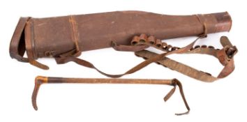 An early 20th century canvas and leather leg-o-mutton gun case,