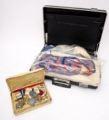 A group of ten various Masonic jewels, together with a collection of various aprons and regalia.