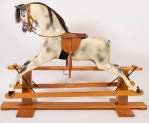 A Haddon Rockers fibreglass rocking horse, painted eyes and face with applied mane,