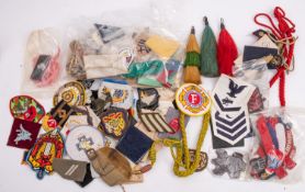 Three military plumes, together with two aiguillettes, a whistle cord,