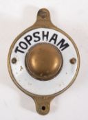 A brass and enamel 'Topsham' bell push.