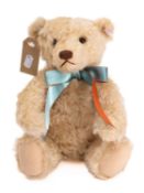 A Steiff 1999 blonde plush Teddy bear, plastic boot button eyes,