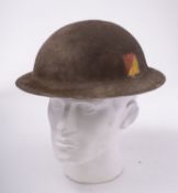 A WWII Canadian Cape Breton Highlanders Mk.I steel helmet stamped and dated 'GSW.