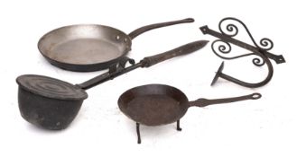 An iron long-handled frying pan with 20cm diameter bowl,