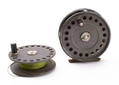 A Hardy 'St John' 3 7/8ths fly reel, single black handle, line tensioner and brass foot,