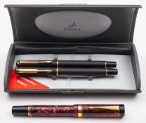 A cased Parker fountain pen and ball pen set in mat grey finish;