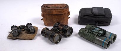 A pair of early 20th century leather cased binoculars,
