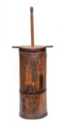 A 19th Century iron bound cylindrical butter churn with twin-handled cover and plunger,