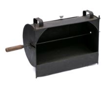 A 19th Century tin hastener with interior handled driven spit and door to the reverse, 52cm wide.